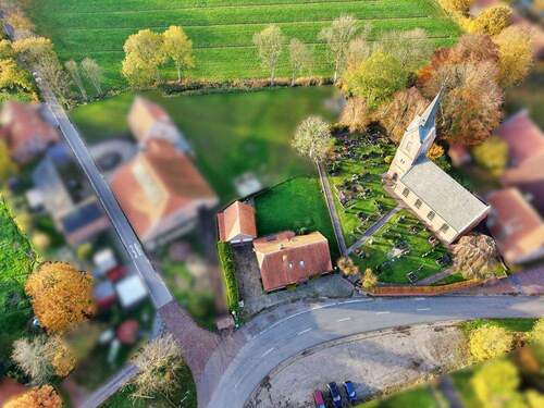 Luftaufnahme - Einfamilienhaus mit 171,30 m&sup2; in Detern / Amdorf zum Kaufen