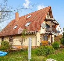 Ruhig gelegenes Mehrfamilienhaus mit 3 WE, Gartenidylle und attraktivem Entwicklungspotenzial - Puschendorf