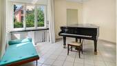 Wohnzimmer - 5 Zimmer Einfamilienhaus zum Kaufen in Berlin
