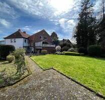 Historisches Mehrfamilienhaus mit 4 Wohnungen & Potenzialgrundstück in guter Lage von Neuenkirchen