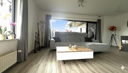 Wohnbereich mit Zugang zur Terrasse - 