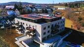 Gebäudeansicht - Bezugsfertige Neubauwohnung mit großer Dachterrasse