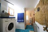 Badezimmer mit Waschmaschinenanschluss - 