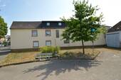 Hausansicht seitlich - Mehrfamilienhaus, Wohnhaus in Budenheim zum Kaufen