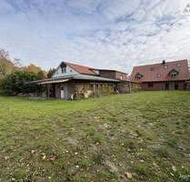 Mehrfamilienhaus mit Gewerbehalle - Hude