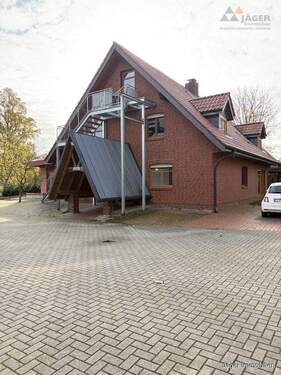 Eingangsansicht - Mehrfamilienhaus, Wohnhaus mit 724,00 m&sup2; in Hude zum Kaufen