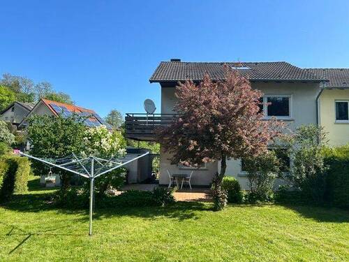 Rückseite aus dem Garten - Doppelhaushälfte mit 145,00 m&sup2; in Petersberg zum Kaufen
