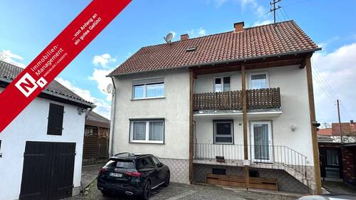 Titelbild - Teilvermietetes Dreifamilienhaus mit Garage und Nebengebäude in ruhiger Lage von Mehlingen