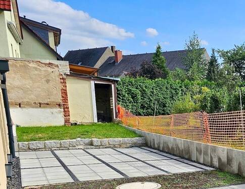 Terrasse mit Blick auf den Garten - Doppelhaushälfte mit 179,50 m² in Dresden zum Kaufen