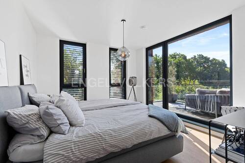 Schlafzimmer Staffelgeschoß mit Balkon - 