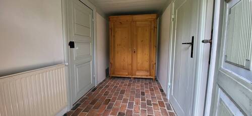 im Flur mit Backsteinboden - 