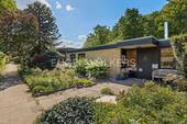 Titel - Lebensqualität auf einer Ebene mit schönem Garten