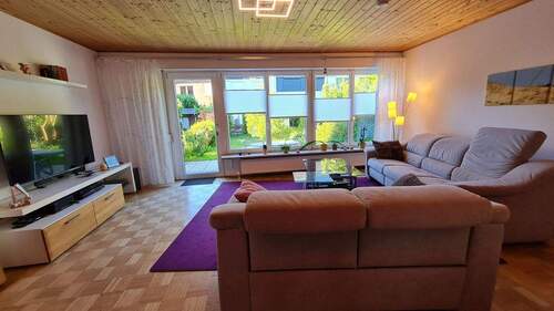 Wohnzimmer mit Gartenblick - Reihenmittelhaus mit 133,00 m² in Kirchheim b. München zum Kaufen