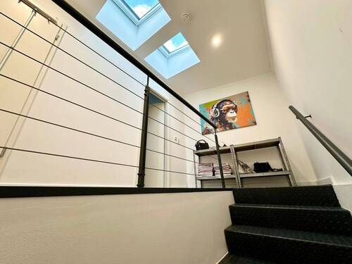 Treppe zur Galerie ins Obergeschoss - 