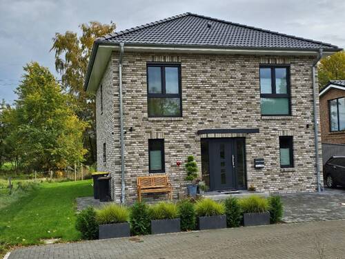 Beispiel Abbildungen mit Sonderleistungen - 4 Zimmer Einfamilienhaus zum Kaufen in Süderheistedt