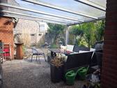 Terrasse mit Glasüberdachung - 
