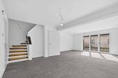 Wohn-Essbereich und Treppenhaus - 5 Zimmer Doppelhaushälfte in Stutensee