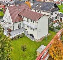 Straubing: Familienfreundliches Zweifamilienhaus mit Garten, Kamin und Garage