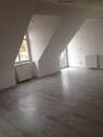 Wohnzimmer m Balkon zum See - 3 Zimmer Etagenwohnung in Mirow