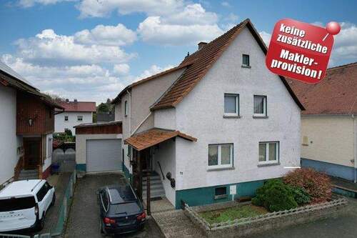 Titelbild mit Pin - Großzügige Wohnung mit Garten und XXL Garage - provisionsfrei