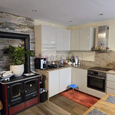 Wohn-/Esszimmer - Gemütliche Erdgeschosswohnung mit Balkon in zentraler, ruhiger Lage