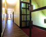 Flur zu den Zimmern - 