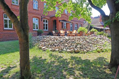 Rückansicht des Hauses mit Terrasse - 