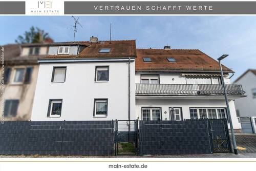 Hausansicht - Zwei Mehrfamilienhäuser mit Garten und Stellplätzen in Dreieich