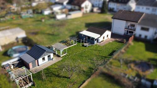 Garten, Gebäuderückseite - Doppelhaushälfte mit 152,00 m&sup2; in Schwalbach / Hülzweiler zum Kaufen