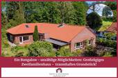 Ärzte & Apotheker Immobilien - Ein Bungalow - unzählige Möglichkeiten: Großzügiges Zweifamilienhaus - traumhaftes Grundstück!