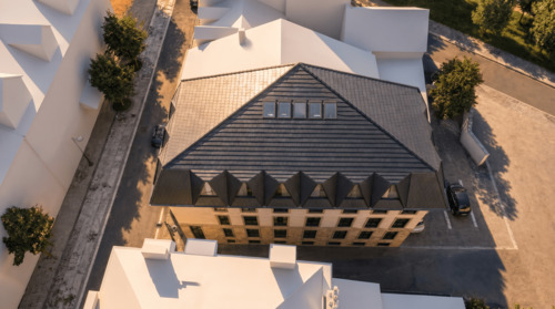 03_Exterior_aerial_goldenhour_v2.png - 
