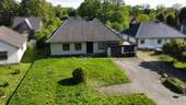 Straßenansicht - 6 Zimmer Bungalow zum Kaufen in Ganderkesee