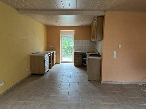 Blick in die Küche Erdgeschoss - Einfamilienhaus mit 100,00 m² in Ruschberg zum Kaufen