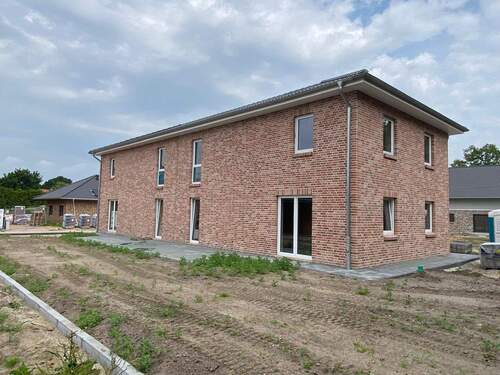 Struvenhütten - DHH - Nienkamp - Garten.jpg - Erstbezug ab 01.11.2025 - Neubau Doppelhaushälfte in ruhiger Lage von Struvenhütten