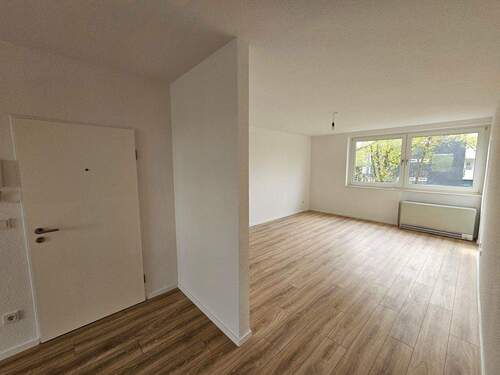 Eingang mit Blick ins Wohnzimmer - Etagenwohnung mit 77,00 m² in Dorsten zur Miete