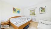 Schlafzimmer mit Ankleideraum - 