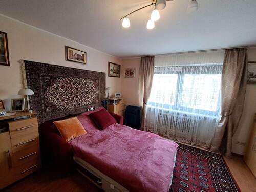 Schlafzimmer - 2 Zimmer Etagenwohnung in Stockdorf