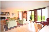 Wohnzimmer - 7 Zimmer Einfamilienhaus zum Kaufen in Adelsried