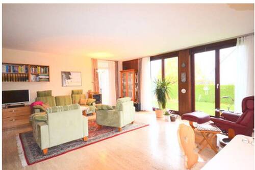 Wohnzimmer - 7 Zimmer Einfamilienhaus zum Kaufen in Adelsried