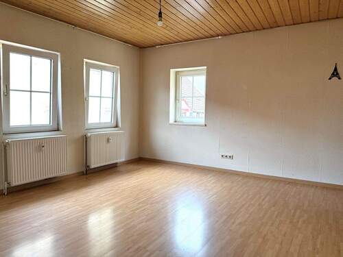 Wohnzimmer Ansicht 2 - 3 Zimmer Etagenwohnung zum Kaufen in Bretten