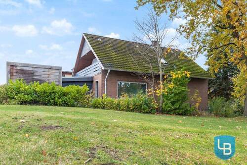 Seitenansicht - Grundbuch statt Sparbuch - Attraktiv vermietetes Zweifamilienhaus