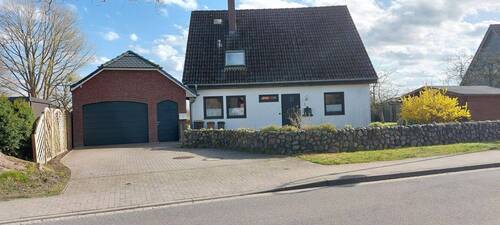 Garagenauffahrt - Einfamilienhaus mit 137,00 m&sup2; in Borstel-Hohenraden zum Kaufen