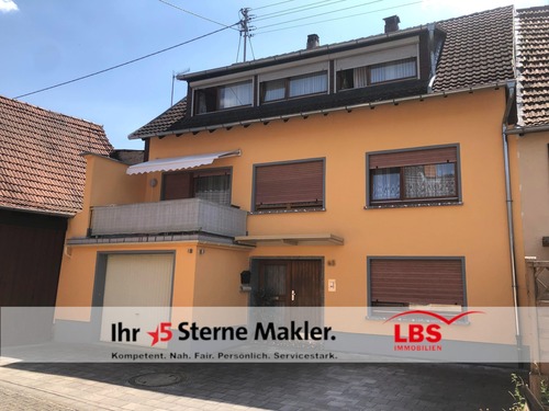 Außenansicht - Reihenmittelhaus mit Balkon, Garage und Garten