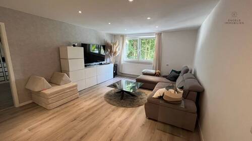 Wohnzimmer Einliegerwohnung - Etagenwohnung mit 110,00 m² in Hennef-Bröl zur Miete
