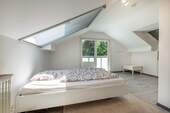 Schlafzimmer im OG mit Balkon - 