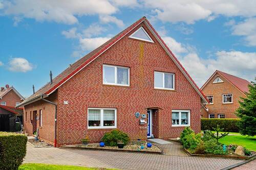 Bild 1 - Familienfreundliches EFH mit 2 Kaminen, Glasfaser & Einliegerwohnung - Top-Lage nahe Nordsee