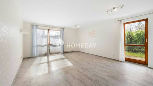 Wohnzimmer 1 - Wohnen in ruhiger Ortsrandlage: Erdgeschosswohnung mit zwei Terrassen, Tageslichtbad und Stellplatz