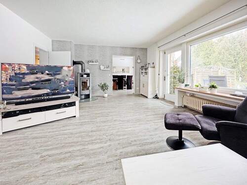 Wohnzimmer - 6 Zimmer Einfamilienhaus zum Kaufen in Lübbecke