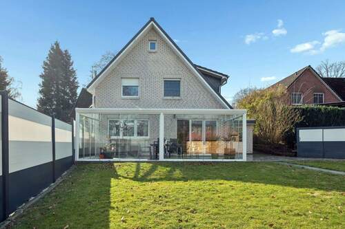 Ansicht aus dem Garten - Familienhaus in Rosengarten-Sottorf - Wohnen direkt am Naturschutzgebiet