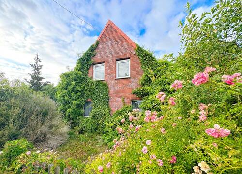 ...umarmt von grüner Natur - Mehrfamilienhaus, Wohnhaus mit 100,00 m² in Aland zum Kaufen